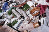 One small section of piles of garbage and trash in landfill