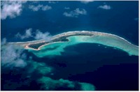 Aerial view of island and coral reef